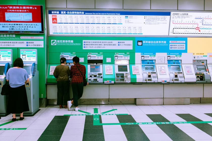 Getting tickets at a train station in Japan